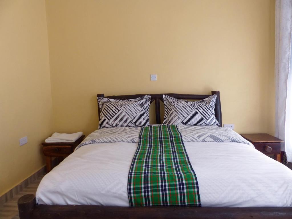 Кровать или кровати в номере KEDOVO Cottages