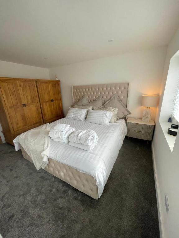 Postel nebo postele na pokoji v ubytování Cwtch Mawr