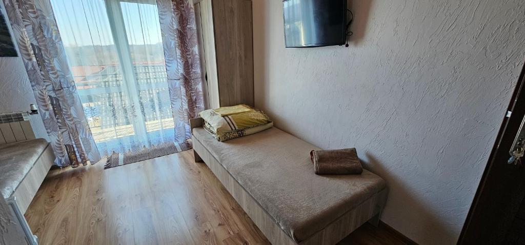Postel nebo postele na pokoji v ubytování Pokoje u Joli Polańczyk