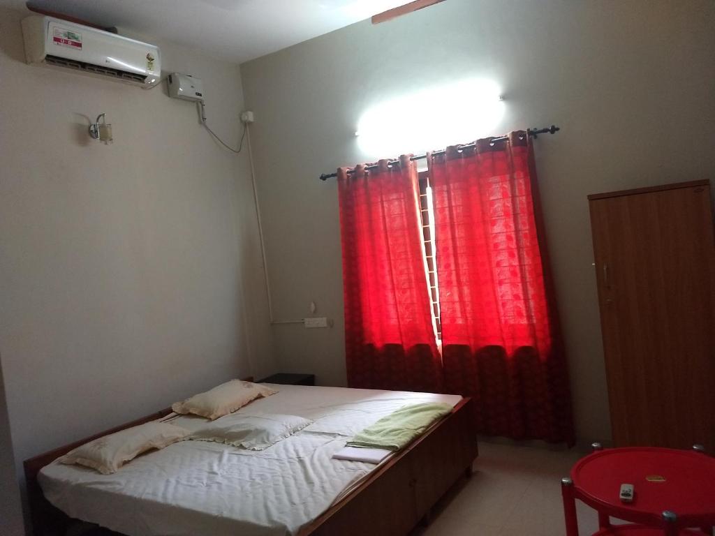 Ένα ή περισσότερα κρεβάτια σε δωμάτιο στο Sinai Homestay