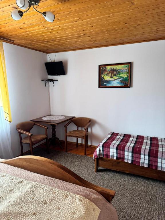 Postel nebo postele na pokoji v ubytování Горизонт