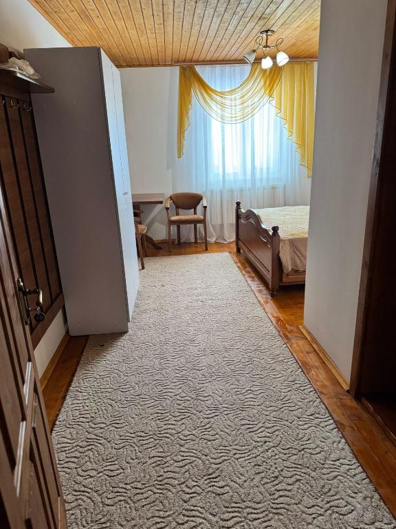 Postel nebo postele na pokoji v ubytování Горизонт