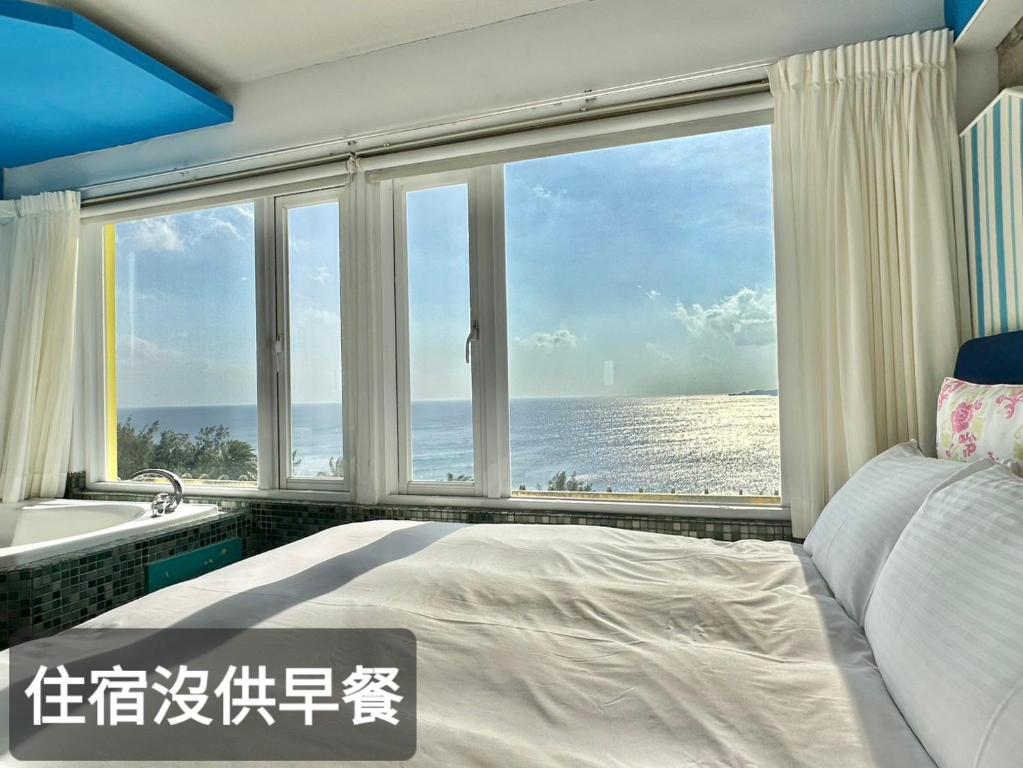 Letto o letti in una camera di 南灣飯店 Kenting Nanwan Hotel