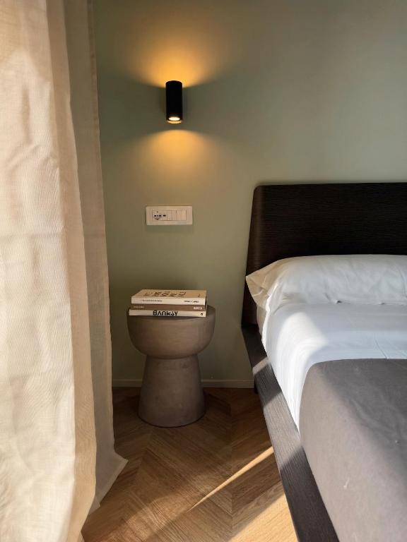 Postel nebo postele na pokoji v ubytování Four Rooms Catania