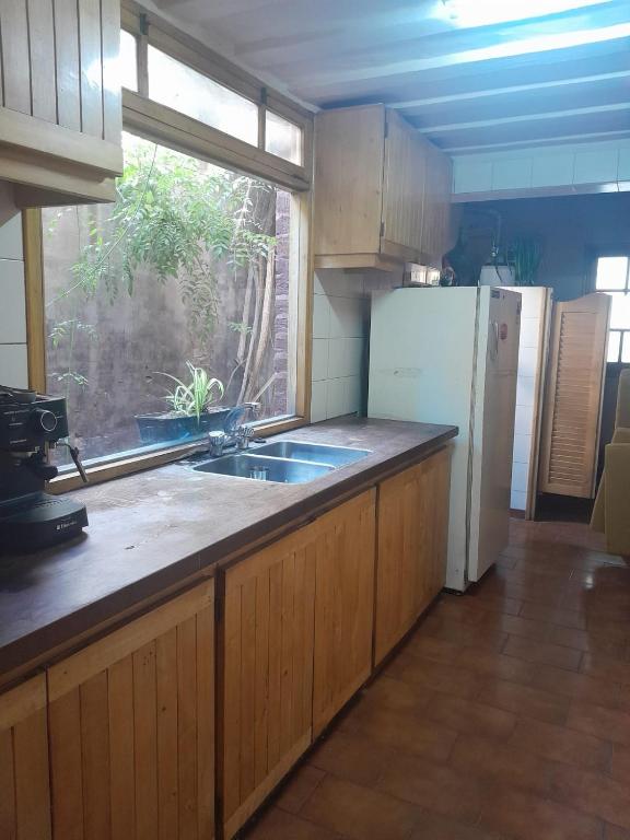 Kuchyň nebo kuchyňský kout v ubytování Arpegio Hostel
