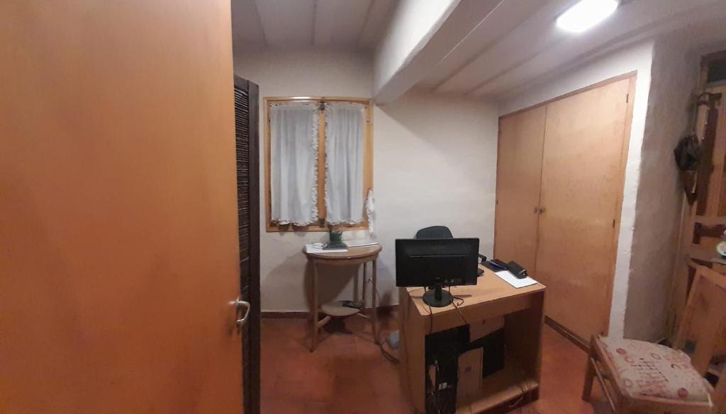 TV a/nebo společenská místnost v ubytování Arpegio Hostel