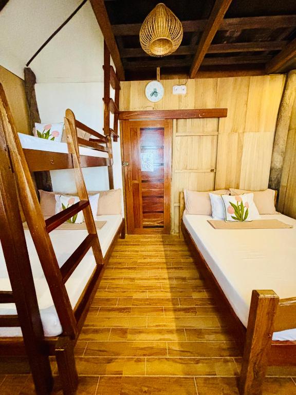 Ένα ή περισσότερα κρεβάτια σε δωμάτιο στο Beachfront Cabin in Lobo