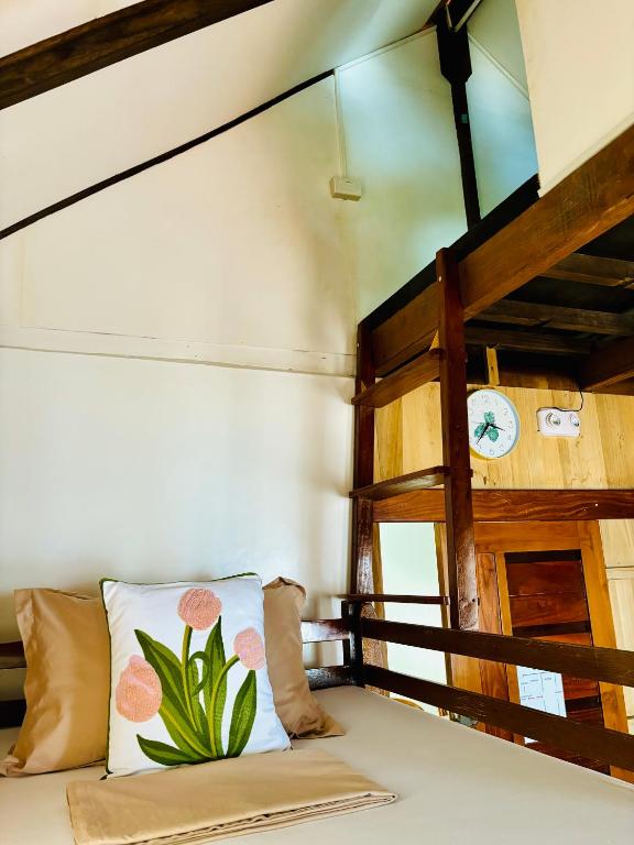 Ένα ή περισσότερα κρεβάτια σε δωμάτιο στο Beachfront Cabin in Lobo