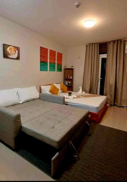 Postel nebo postele na pokoji v ubytování Jaymiellah's Suite