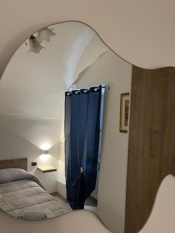 A bed or beds in a room at La Minicasa