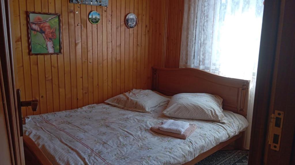Postel nebo postele na pokoji v ubytování Sofi