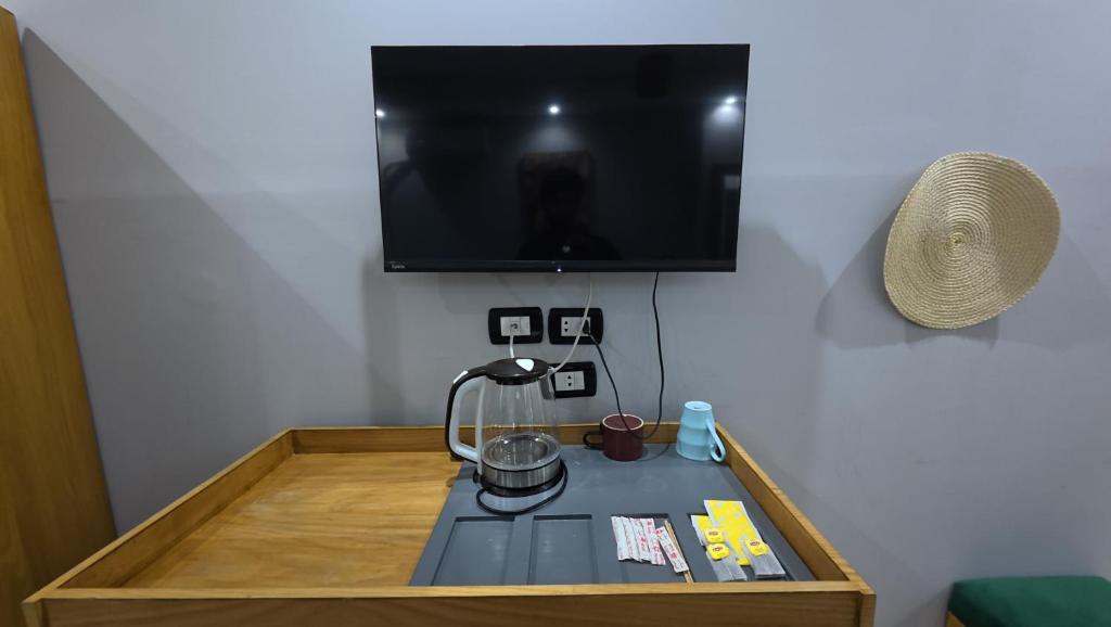 TV a/nebo společenská místnost v ubytování Hostalio Pyramid View