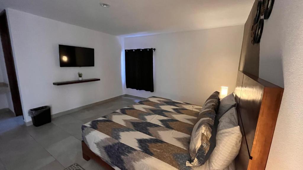 Postel nebo postele na pokoji v ubytování Pedernal Hotel