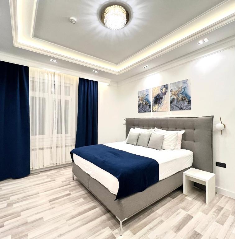 Postel nebo postele na pokoji v ubytování Hotel Forever