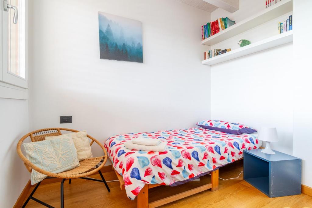 Posteľ alebo postele v izbe v ubytovaní attico in un'oasi di verde sui navigli - NavigliApartments