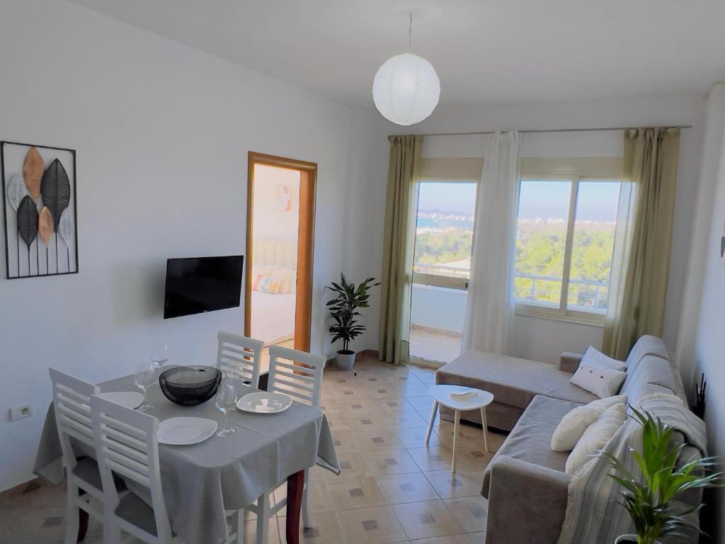 TV a/nebo společenská místnost v ubytování LunaSol seaside Apartments