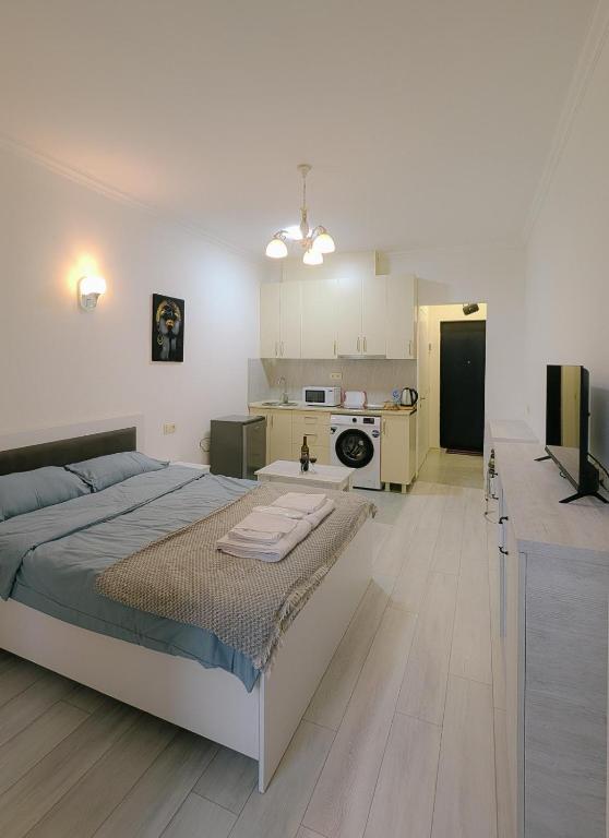 Postel nebo postele na pokoji v ubytování Luxury apartment in Batumi