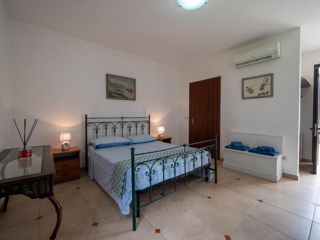 Postel nebo postele na pokoji v ubytování Agriturismo Twin Tails - Sant'Isidoro