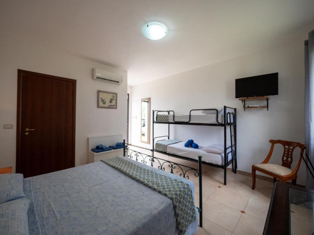Postel nebo postele na pokoji v ubytování Agriturismo Twin Tails - Sant'Isidoro