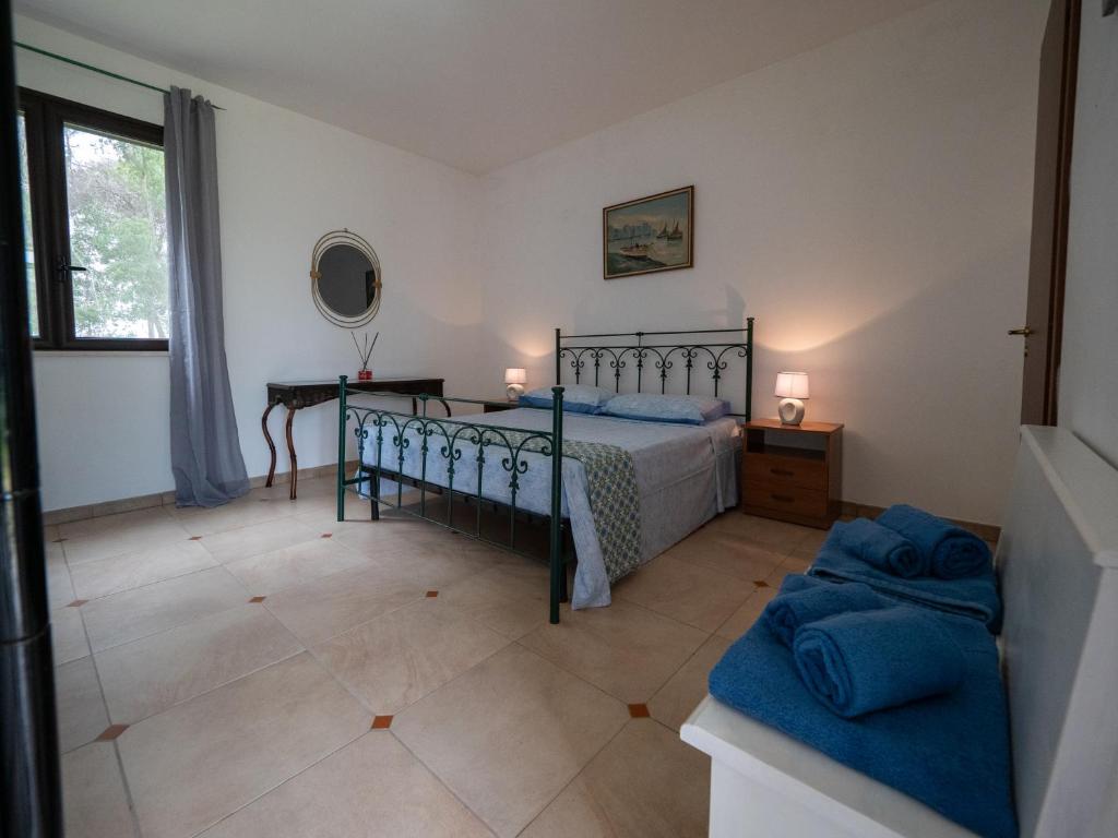 Postel nebo postele na pokoji v ubytování Agriturismo Twin Tails - Sant'Isidoro