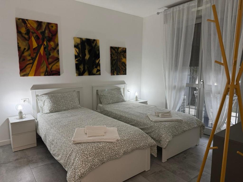 Postel nebo postele na pokoji v ubytování Maison Du Pic - Rho Fiera