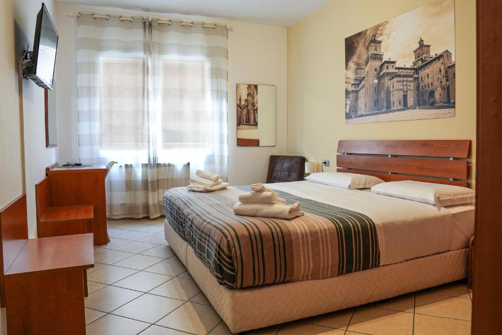 Postel nebo postele na pokoji v ubytování SMART HOTEL