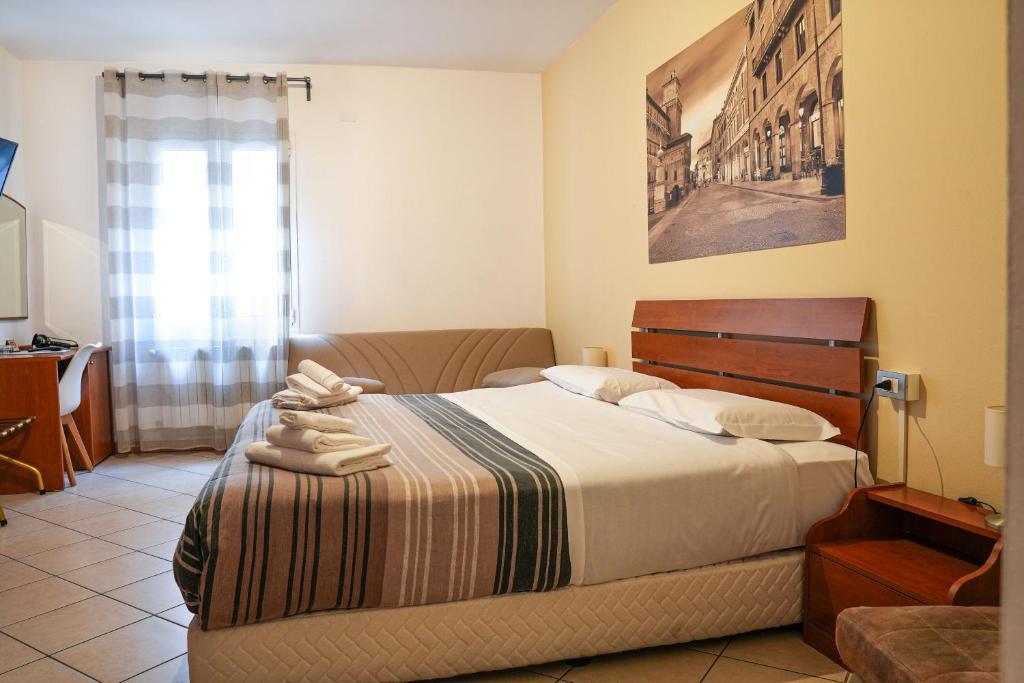 Postel nebo postele na pokoji v ubytování SMART HOTEL