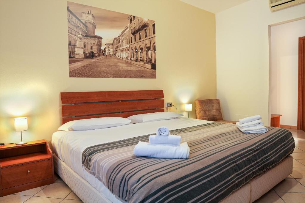 Postel nebo postele na pokoji v ubytování SMART HOTEL