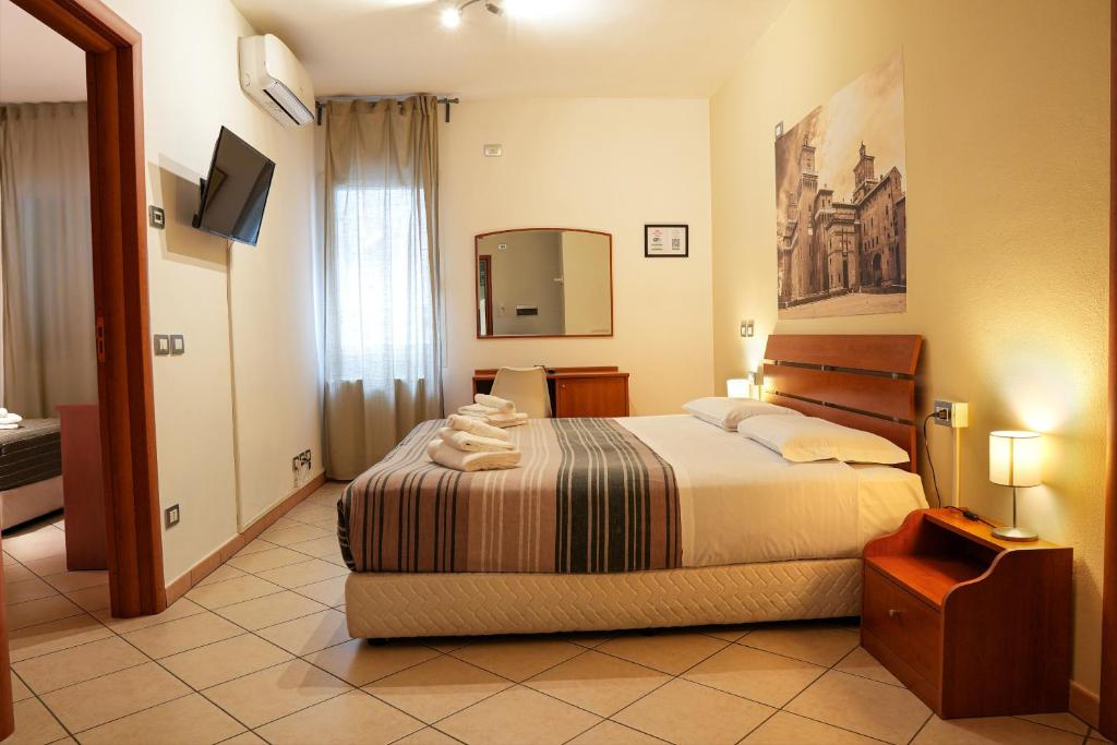 Postel nebo postele na pokoji v ubytování SMART HOTEL