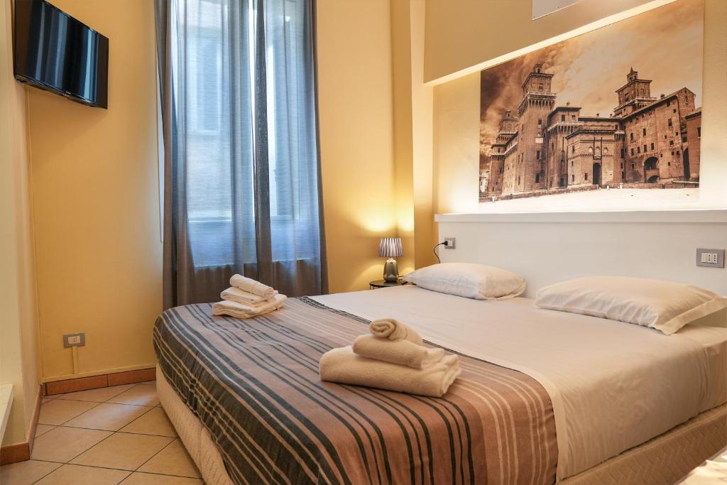 Postel nebo postele na pokoji v ubytování SMART HOTEL