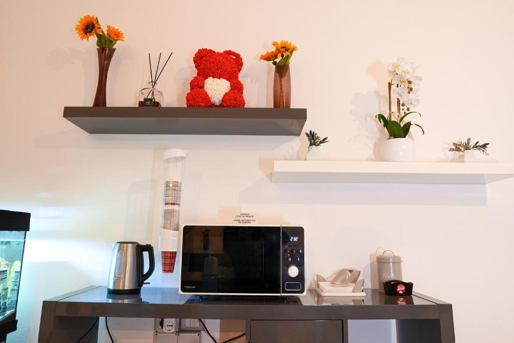 TV a/nebo společenská místnost v ubytování SMART HOTEL