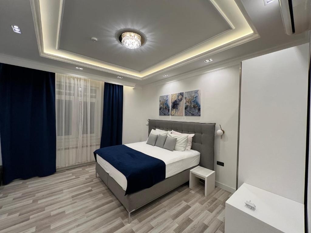 Postel nebo postele na pokoji v ubytování Hotel Forever