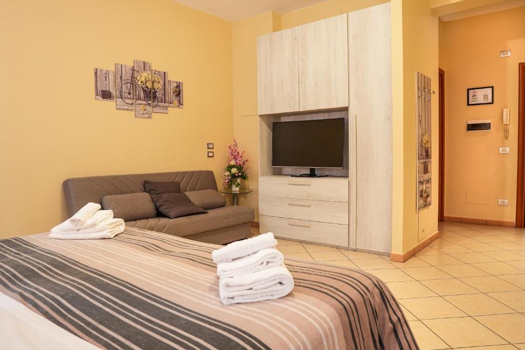 TV a/nebo společenská místnost v ubytování SMART HOTEL