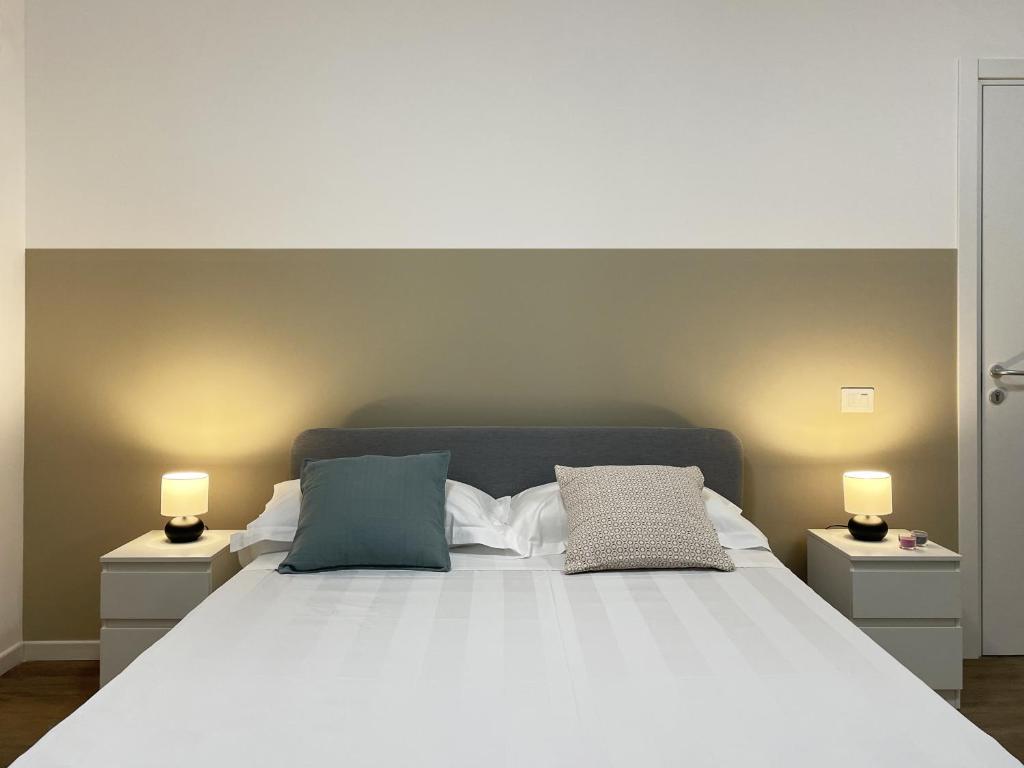 Postel nebo postele na pokoji v ubytování Guest House Biscardi