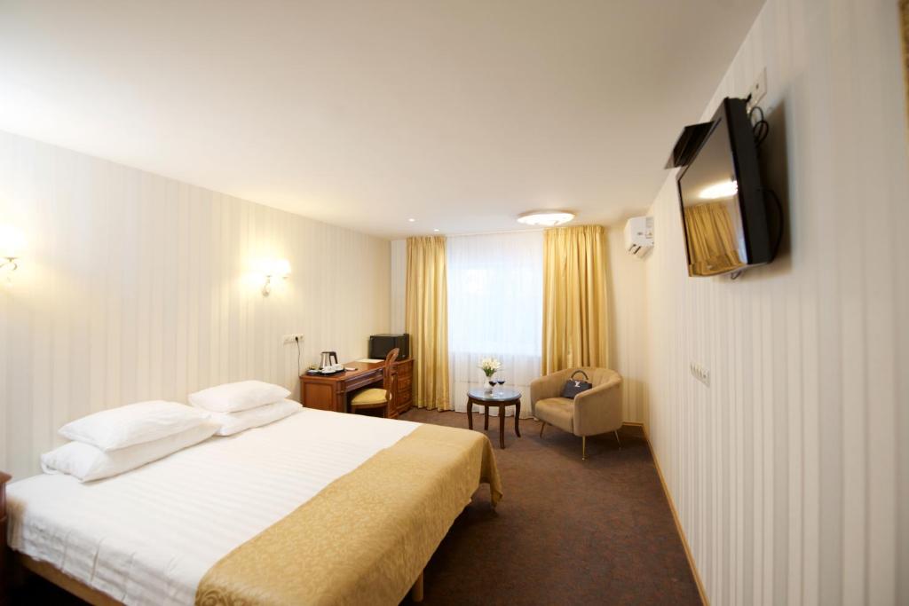 TV a/nebo společenská místnost v ubytování Villa Hotel Theresa