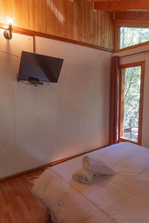 Cama o camas de una habitación en Cascadas del Llaima