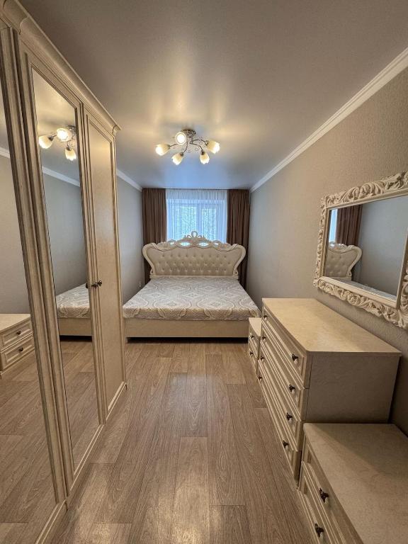 Postel nebo postele na pokoji v ubytování Аэропорт Алматы