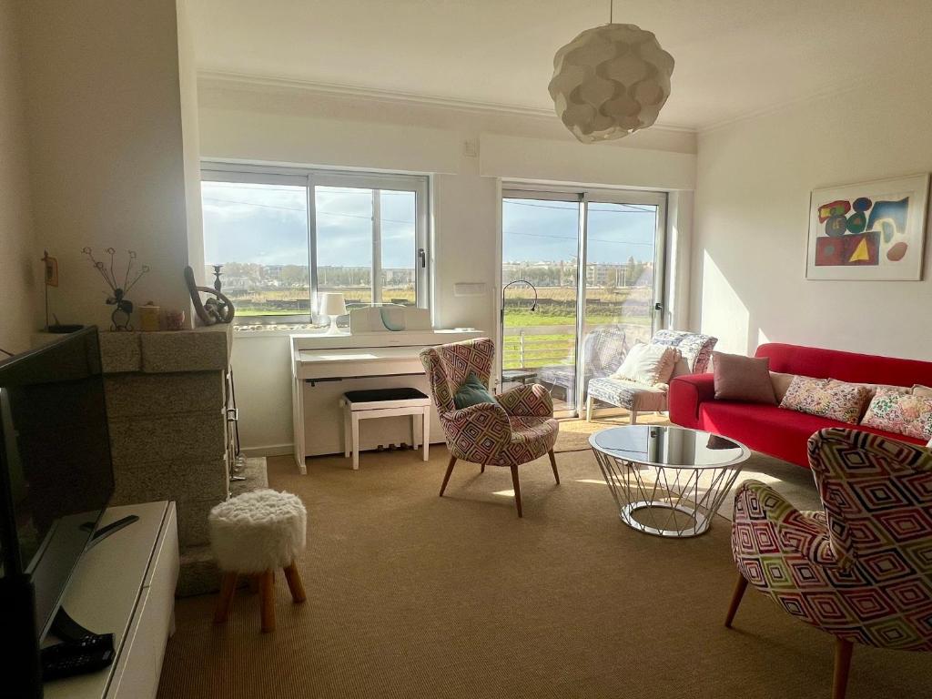 Χώρος καθιστικού στο Superbe appartement près des plages d'Azurara