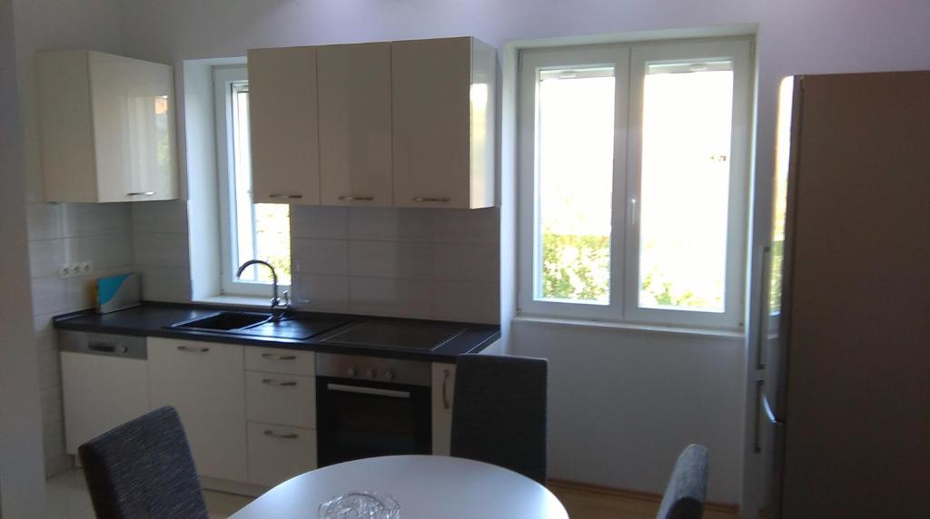 Kuchyňa alebo kuchynka v ubytovaní Centar Split Apartments Manuš