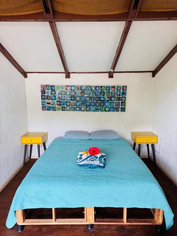 Postel nebo postele na pokoji v ubytování Mata Nui Eco hostel