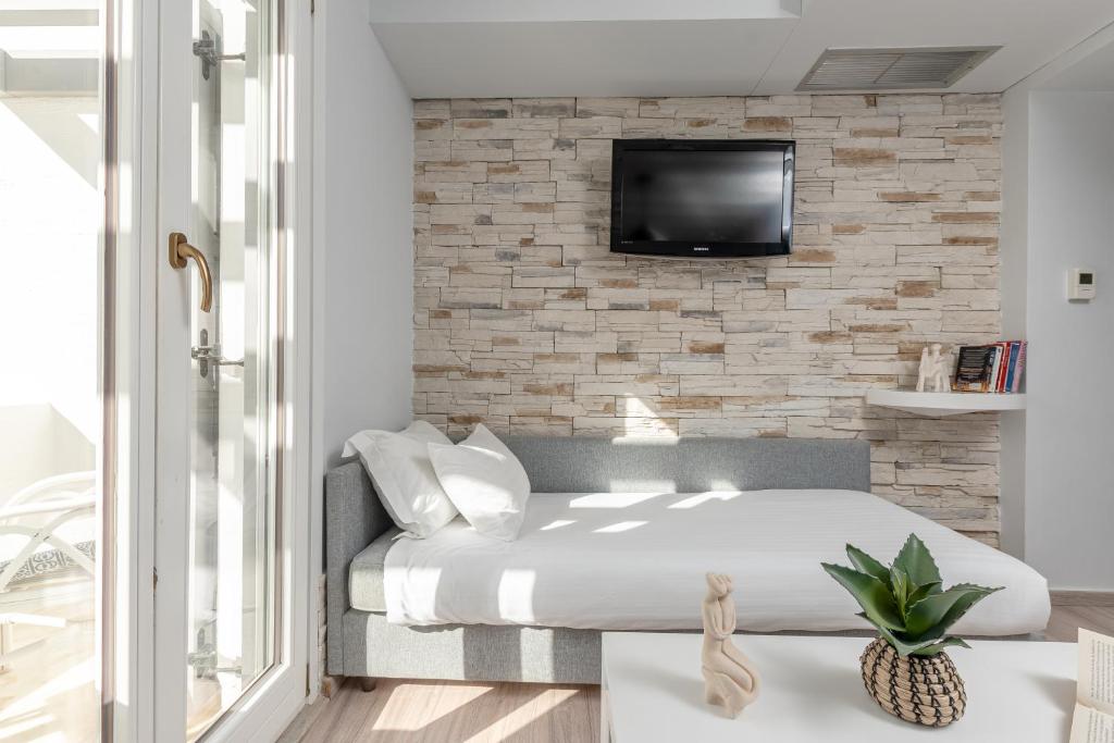 TV a/nebo společenská místnost v ubytování Galaxy Hotel Naxos