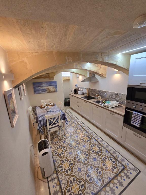 Kuchyň nebo kuchyňský kout v ubytování Amelie - Charming Townhouse in the heart of Rabat