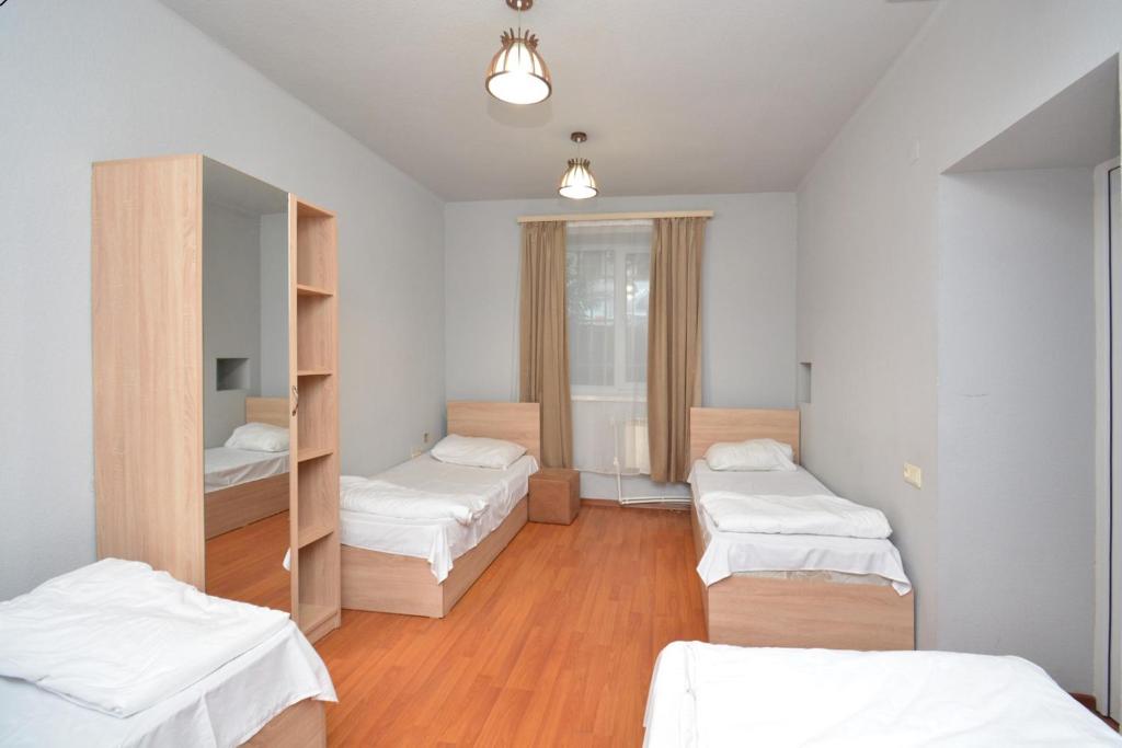 Postel nebo postele na pokoji v ubytování C&H guest house