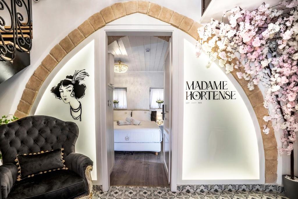 Postel nebo postele na pokoji v ubytování Madame Hortense Boutique Ηotel