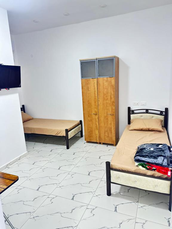 Postel nebo postele na pokoji v ubytování Steele honey