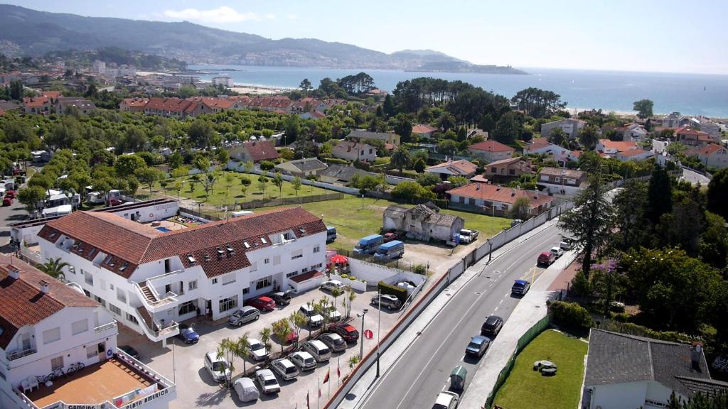 an aerial view of a town with a street at Apartamentos Telleira in Nigrán