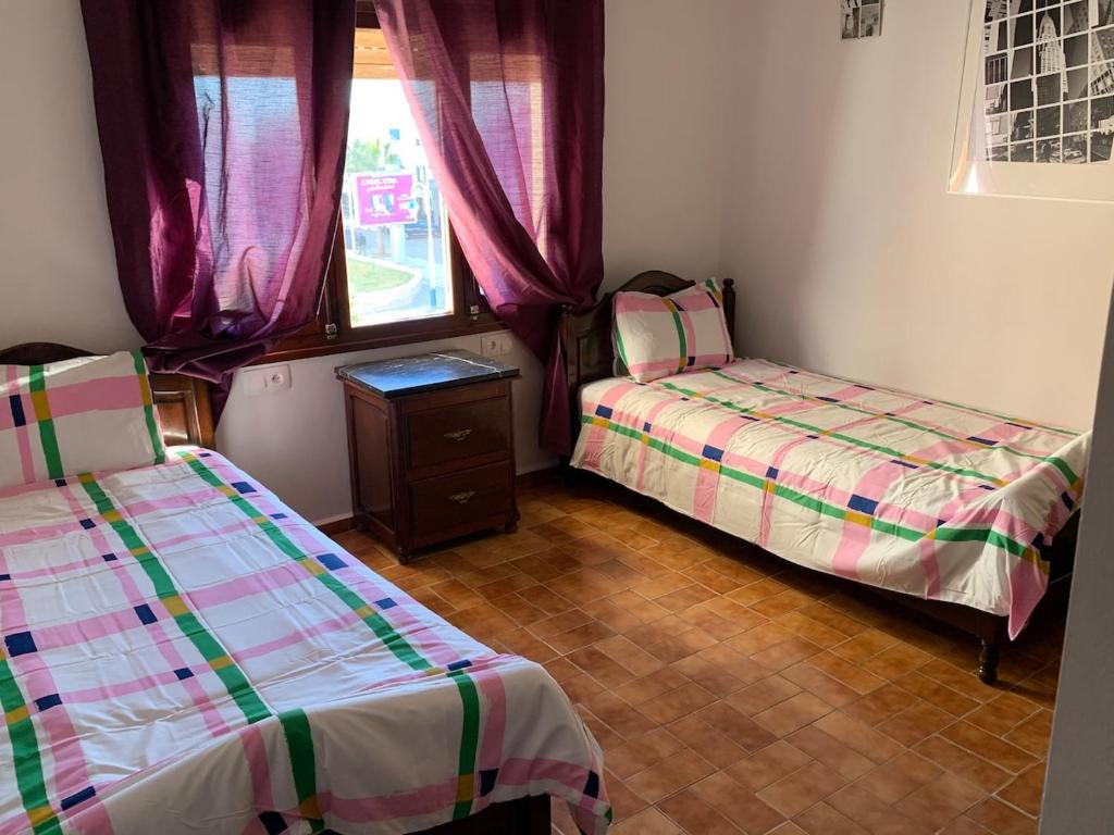 Postel nebo postele na pokoji v ubytování Casa melo