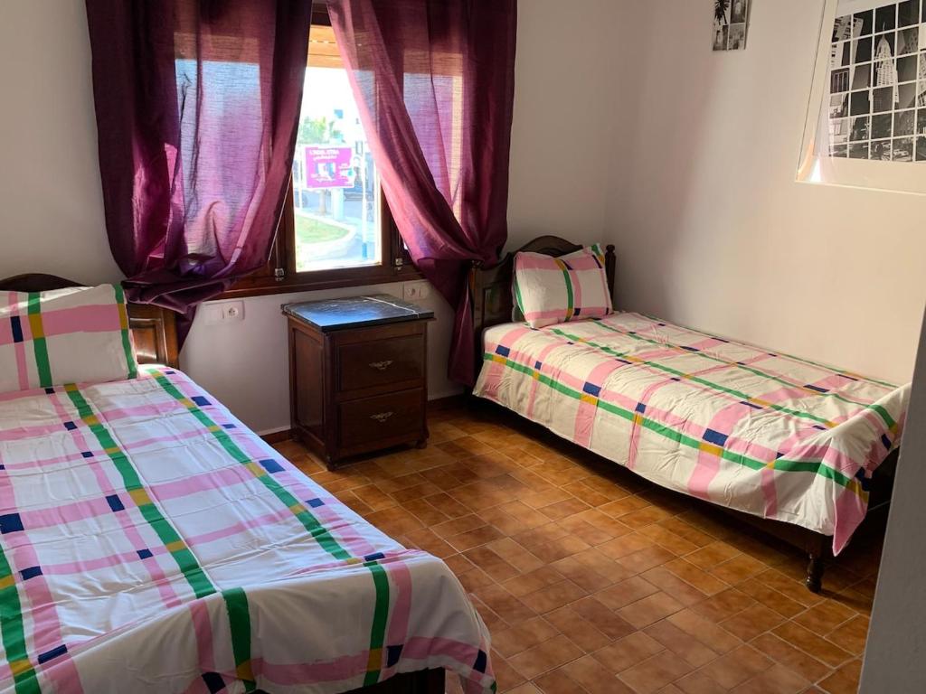 Postel nebo postele na pokoji v ubytování Casa melo