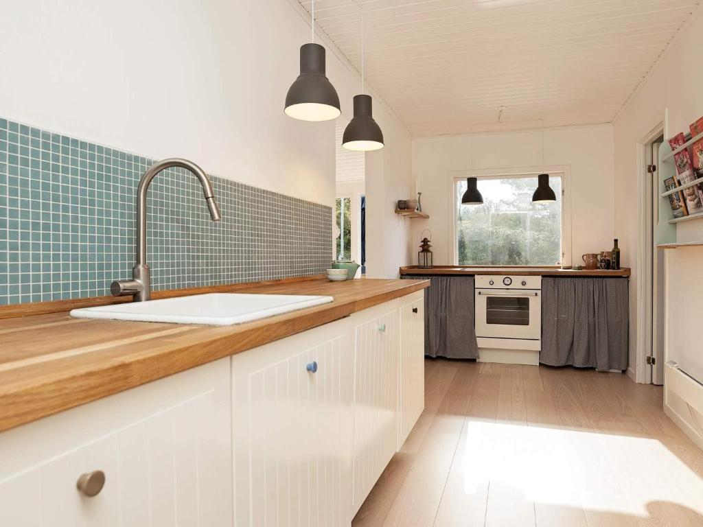 Kuchyň nebo kuchyňský kout v ubytování Charming Beach House - By Traum Ferienwohnungen