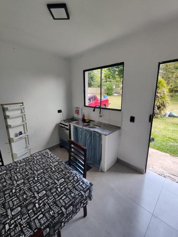Postel nebo postele na pokoji v ubytování Pássaros e Flores
